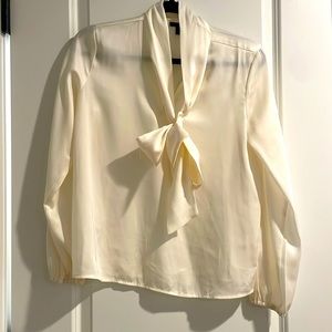 Ann Taylor cream Satin top with a tie